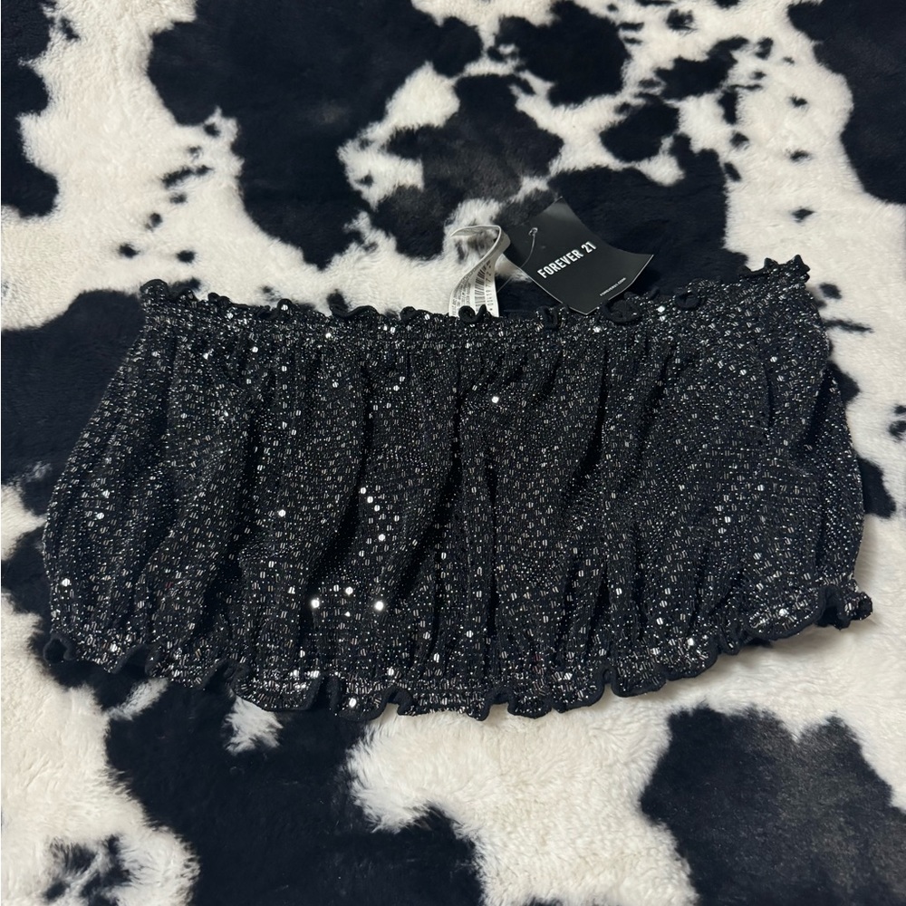 Black glittery top.